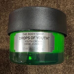 The Body Shop Youth Cream in Green Jar with Black Lid